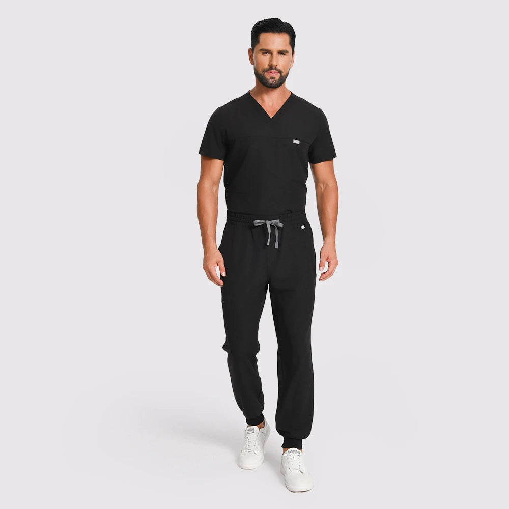KungFu Scrubs men's black scrub pants full body front view with jogger cuffs
