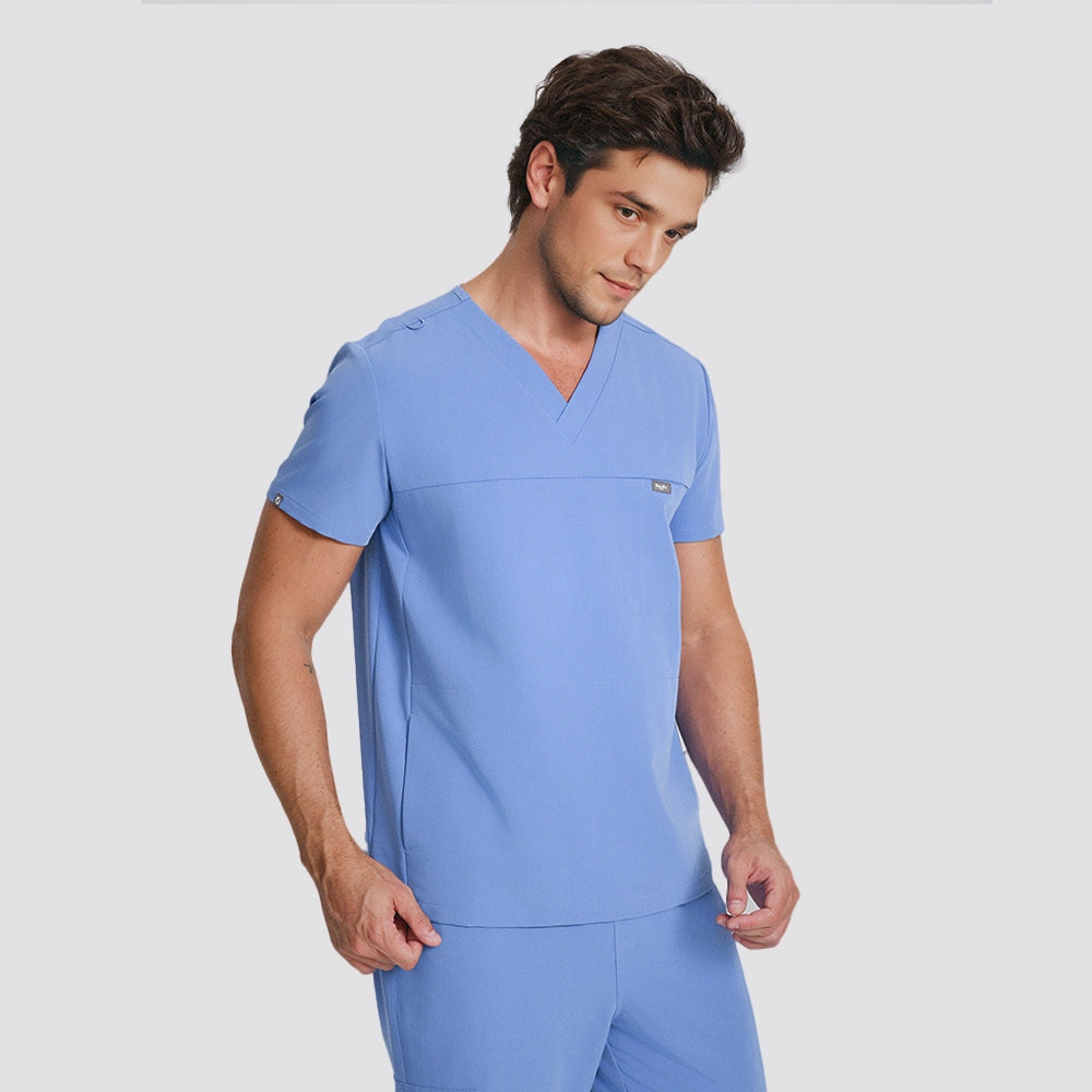 KungFu Scrubs ceil blue men's V-neck scrub top close-up with clean chest design and soft fabric look