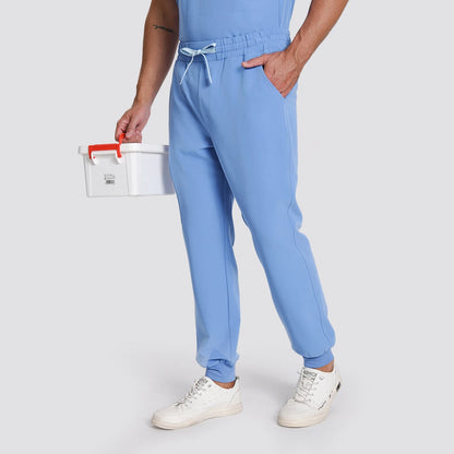 KungFu Scrubs men's ceil blue scrub pants angled front view with side pocket