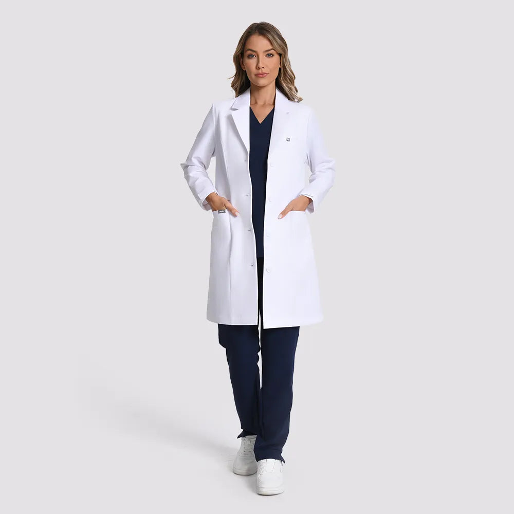 KungFu Scrubs women's long white lab coat full front view over navy scrubs